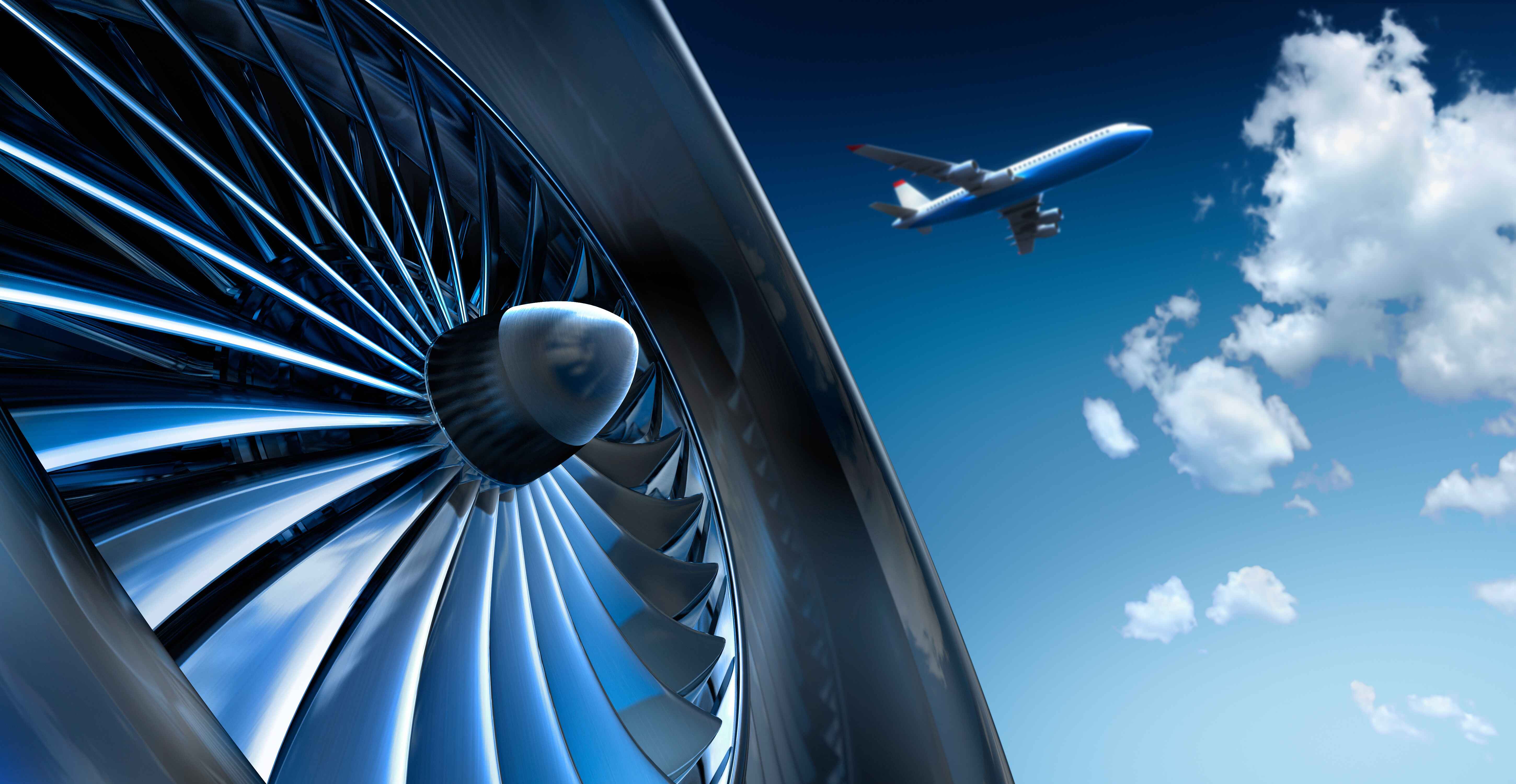 Gros plan d'un réacteur avec un avion en fond dans le ciel