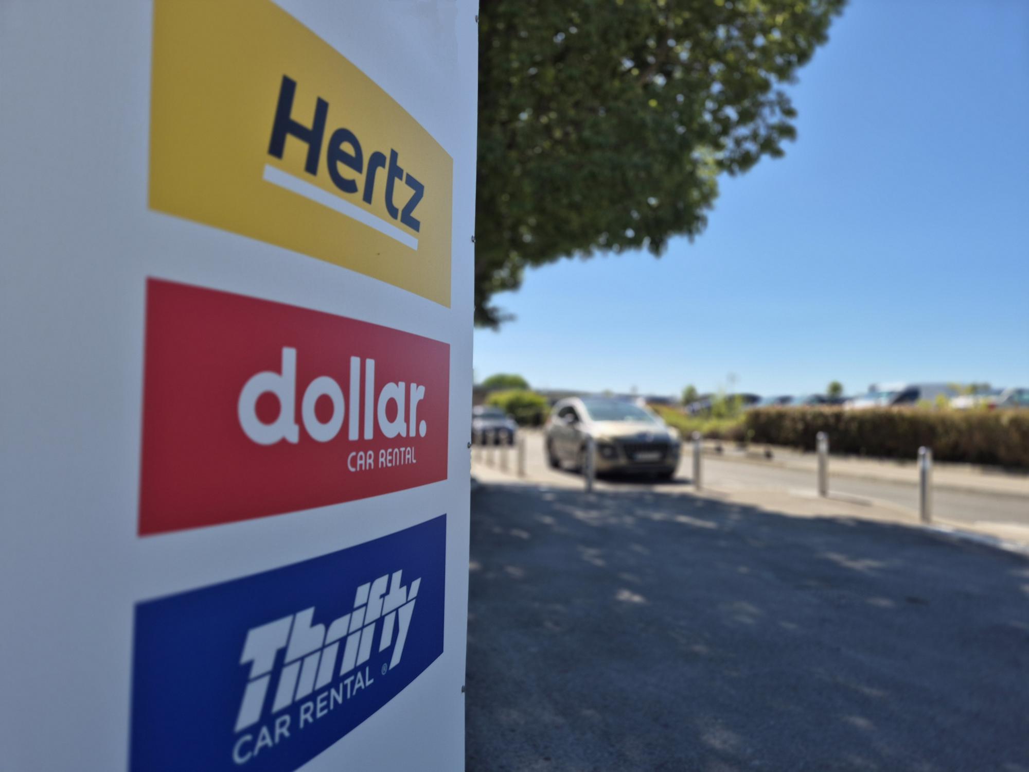 logo hertz dollar thrifty